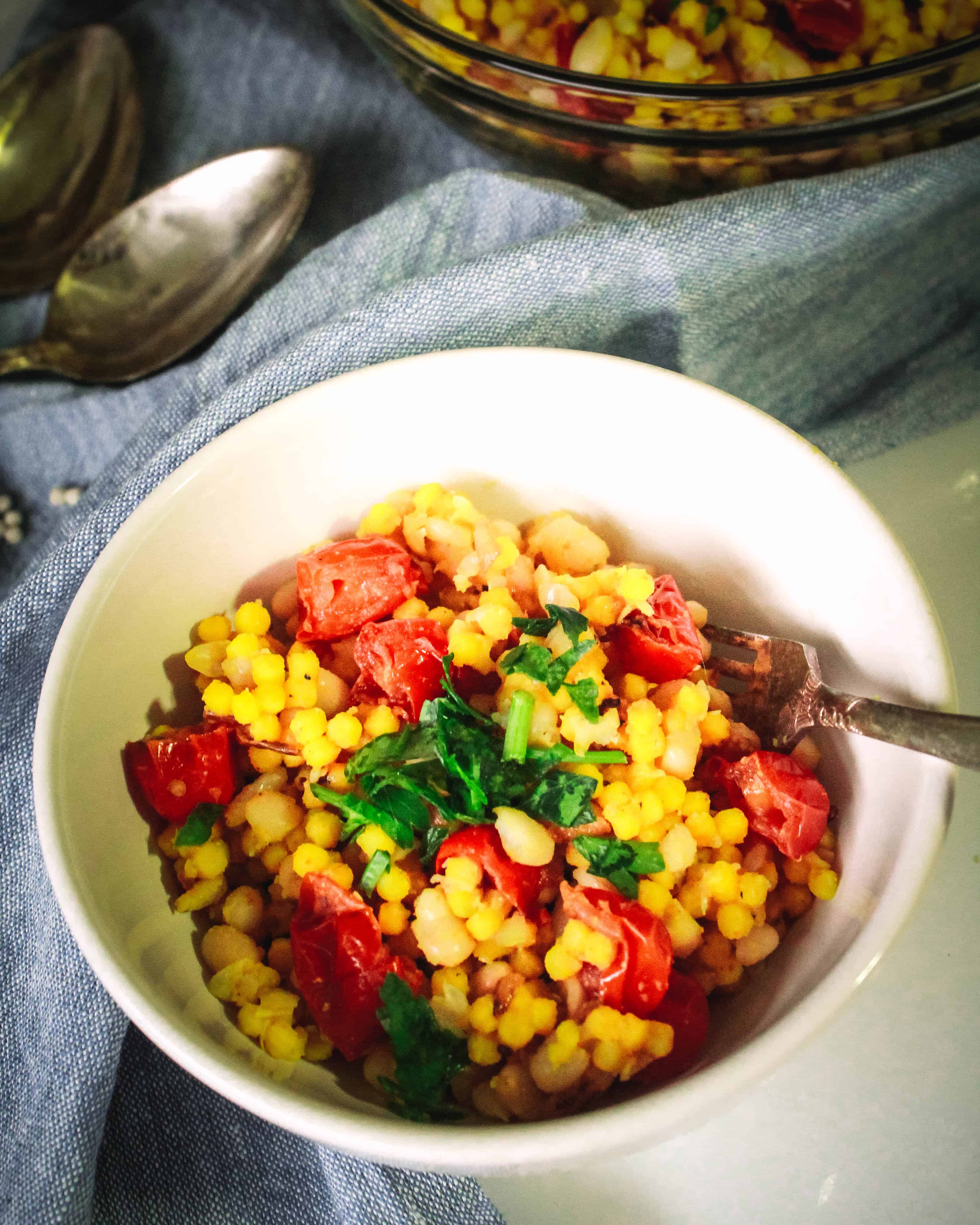 Turmeric Couscous with Navy Beans and Cherry Tomatoes