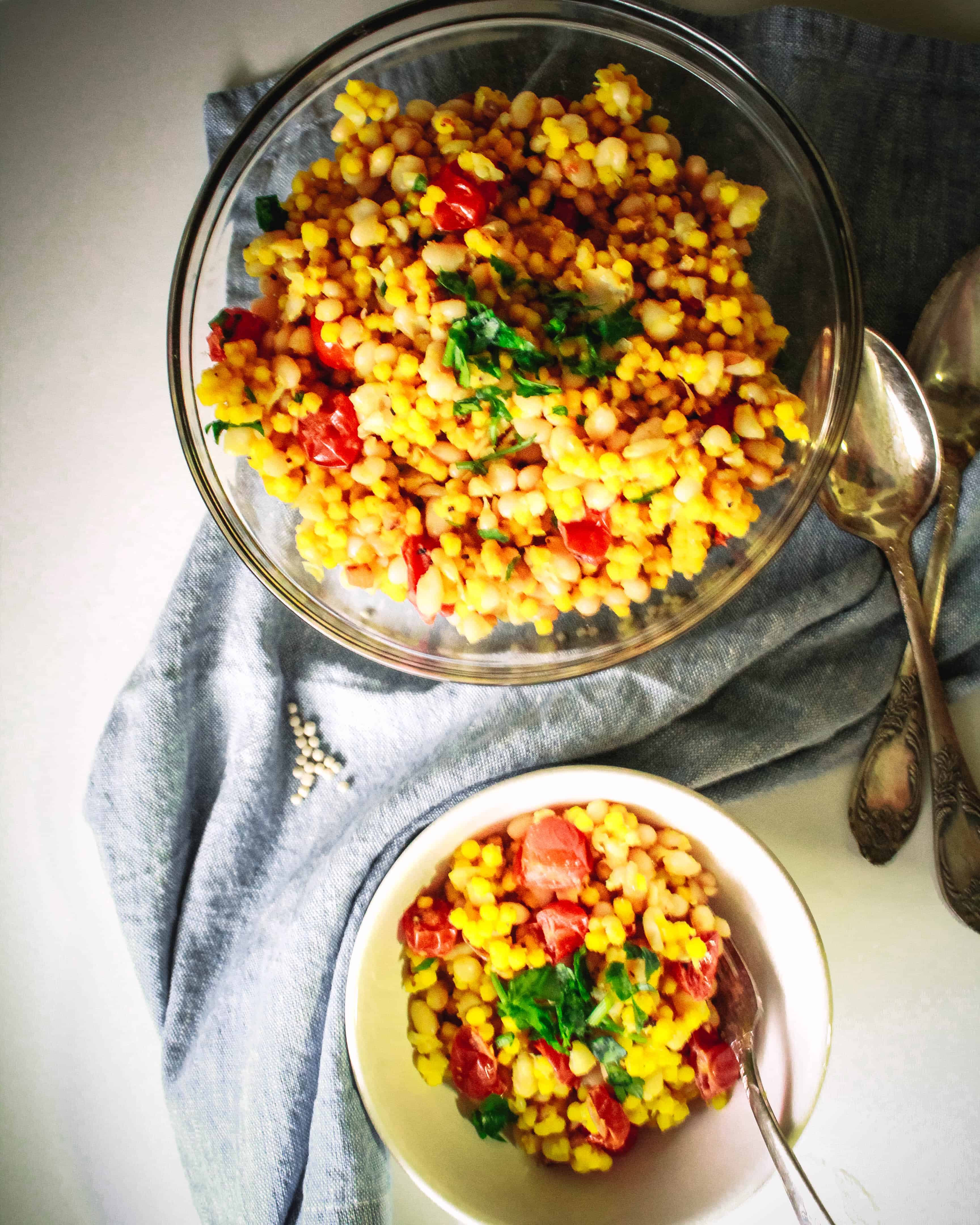 Turmeric Couscous with Navy Beans and Cherry Tomatoes