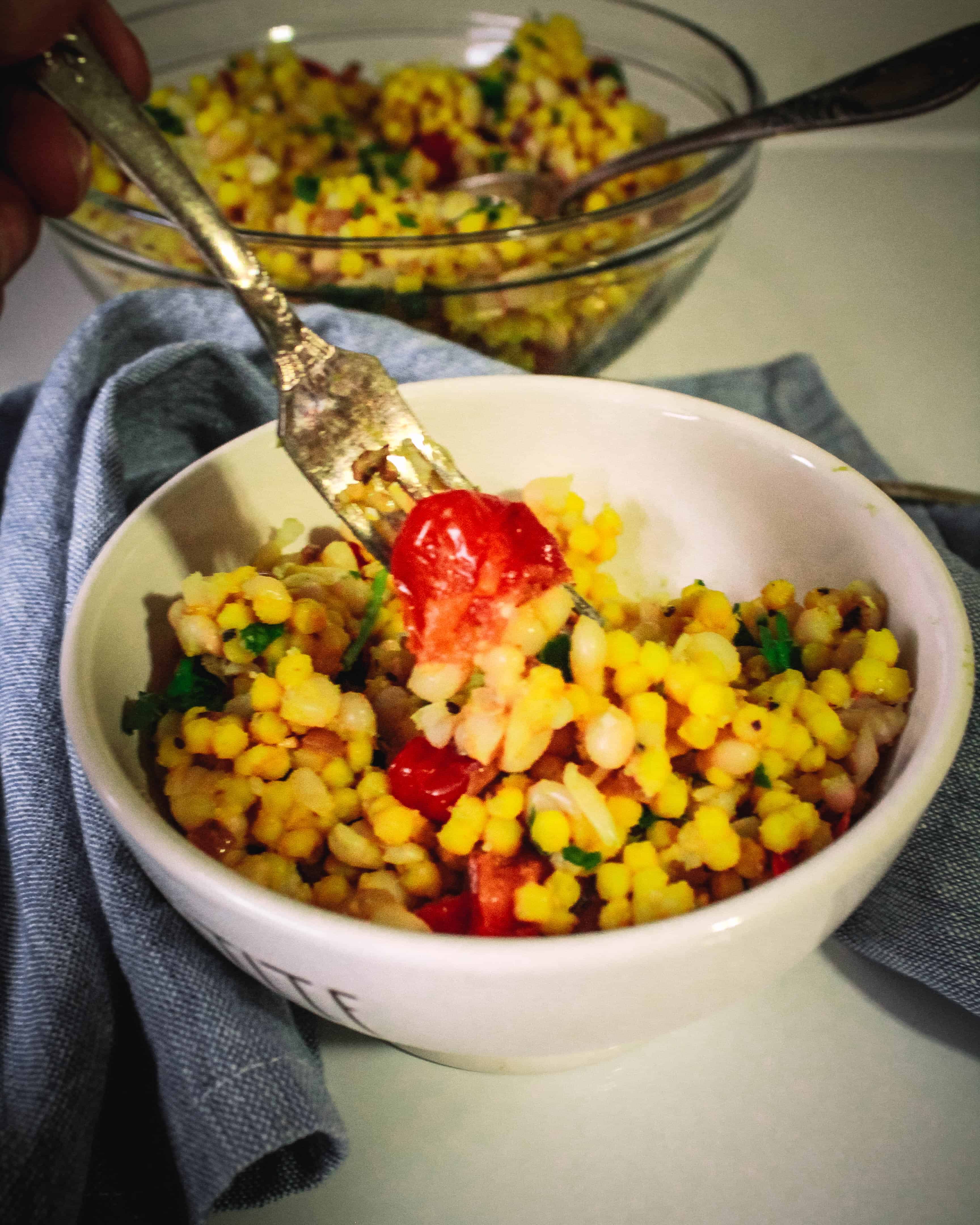 Turmeric Couscous with Navy Beans and Cherry Tomatoes