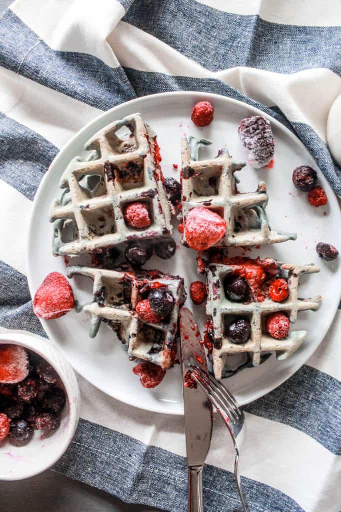 Never go hungry! Make this easy and healthy Gluten-Free Vegan Berry Waffles recipe for breakfast. It's delicious, low cabr, perfect for weight loss, and kid approved! #vegan #glutenfree #veganbreakfast #veganrecipe #glutenfreebreakfast #glutenfreerecipe