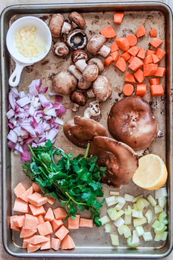 I made this Hearty Root Vegetable Mushroom Stew over the weekend and it was so delicous! It's a healthy, easy, vegetairian stew stove top recipe that will become your go-to on cold winter nights! #stew #vegan #veganrecipe #vegetarian