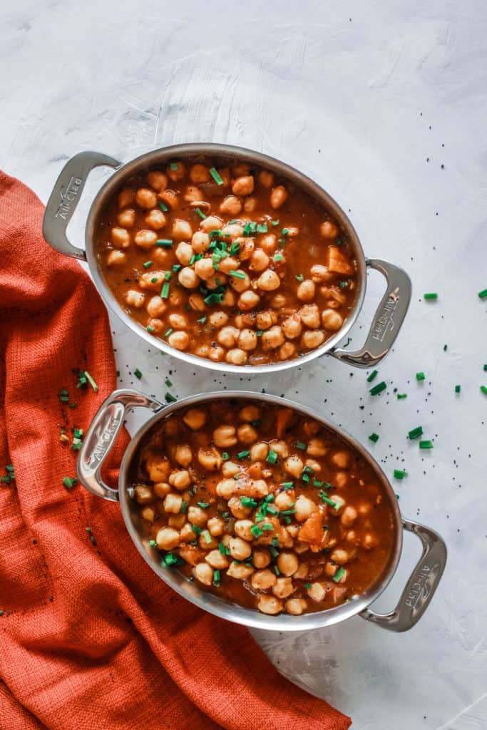 Simple and easy vegan Turkish Chickpea Stew with Dried Apricots recipe that is healthy, hearty, and only takes 30 minutes to make! #turkish #stew #vegan