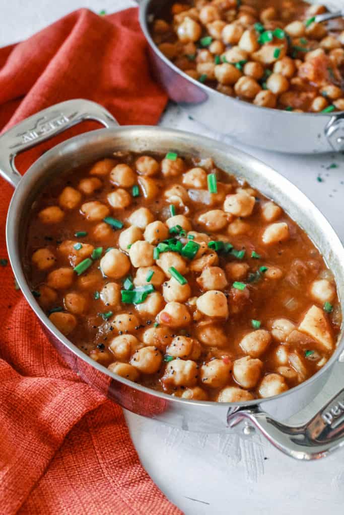 Simple and easy vegan Turkish Chickpea Stew with Dried Apricots recipe that is healthy, hearty, and only takes 30 minutes to make! #turkish #stew #vegan