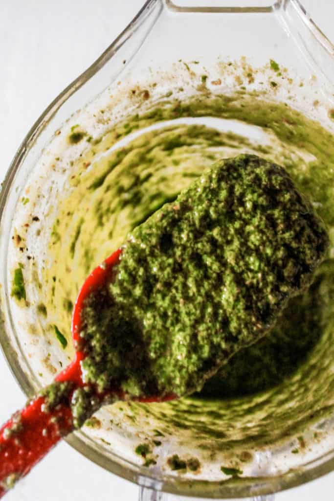 Creamy and crunchy Pistachio Pesto recipe that’s ready in 10 minutes! It’s great to use in pastas, salads, or as an appetizer! #pesto #pistachio #sauce