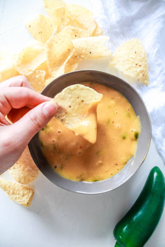 This vegan Jalapeno Queso Dip recipe is potato-based and is nut free and dairy-free. It’s a perfect party appetizer to enjoy with tortilla chips or veggies! #veganquThis vegan Jalapeno Queso Dip recipe is potato-based and is nut free and dairy-free. It’s a perfect party appetizer to enjoy with tortilla chips or veggies! #veganqueso #dairyfree #nutfreeeso #dairyfree #nutfree