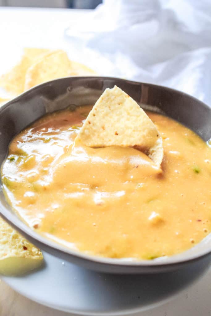 This vegan Jalapeno Queso Dip recipe is potato-based and is nut free and dairy-free. It’s a perfect party appetizer to enjoy with tortilla chips or veggies! #veganqueso #dairyfree #nutfree