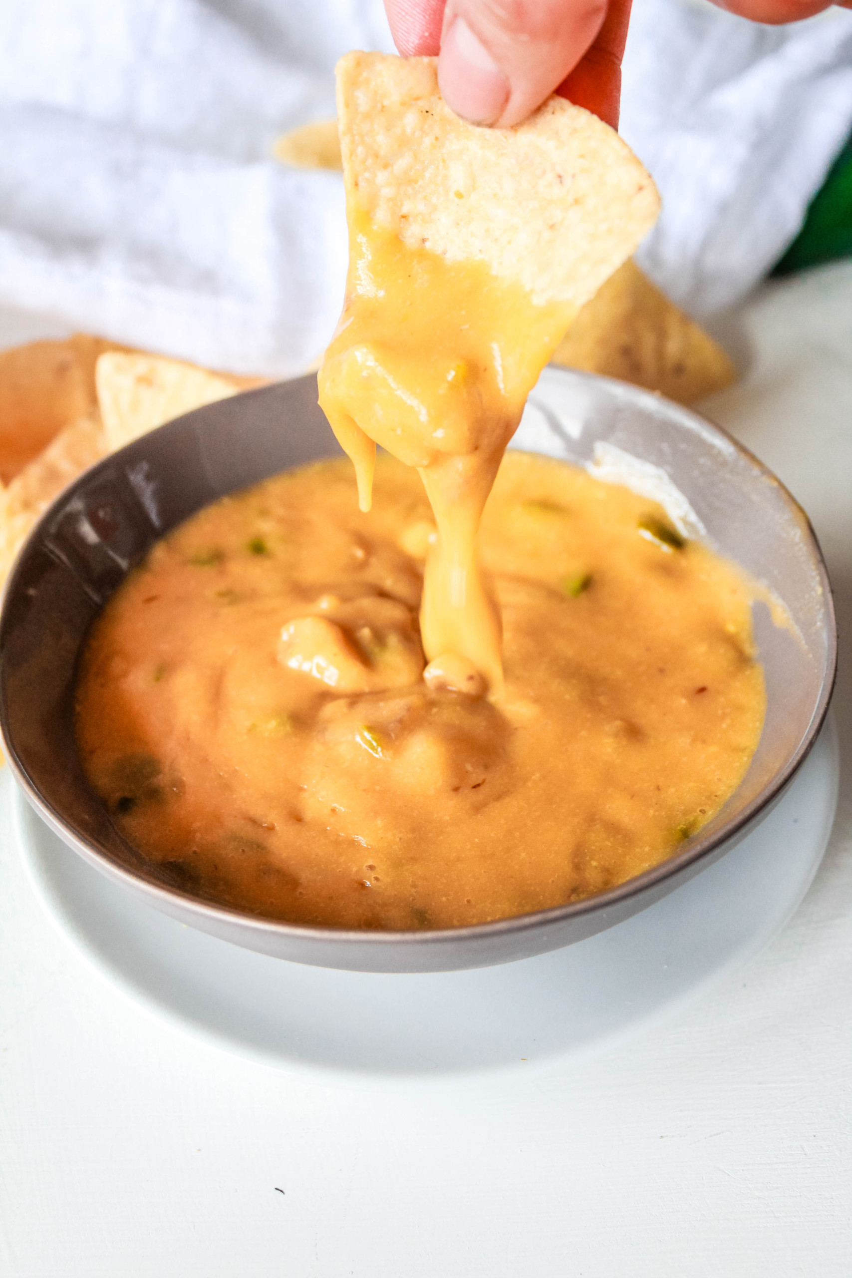 This vegan Jalapeno Queso Dip recipe is potato-based and is nut free and dairy-free. It’s a perfect party appetizer to enjoy with tortilla chips or veggies! #veganqueso #dairyfree #nutfree