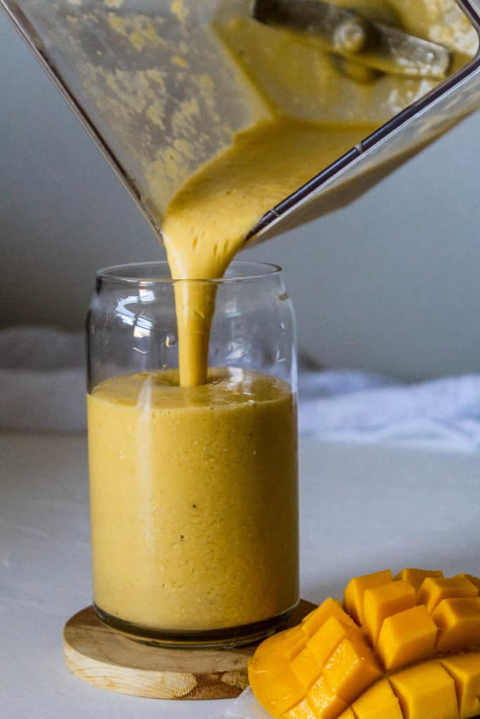 Healthy Mango Breakfast Smoothie that’s a great meal replacement and will give you all day energy! #weightloss #healthy #smoothie