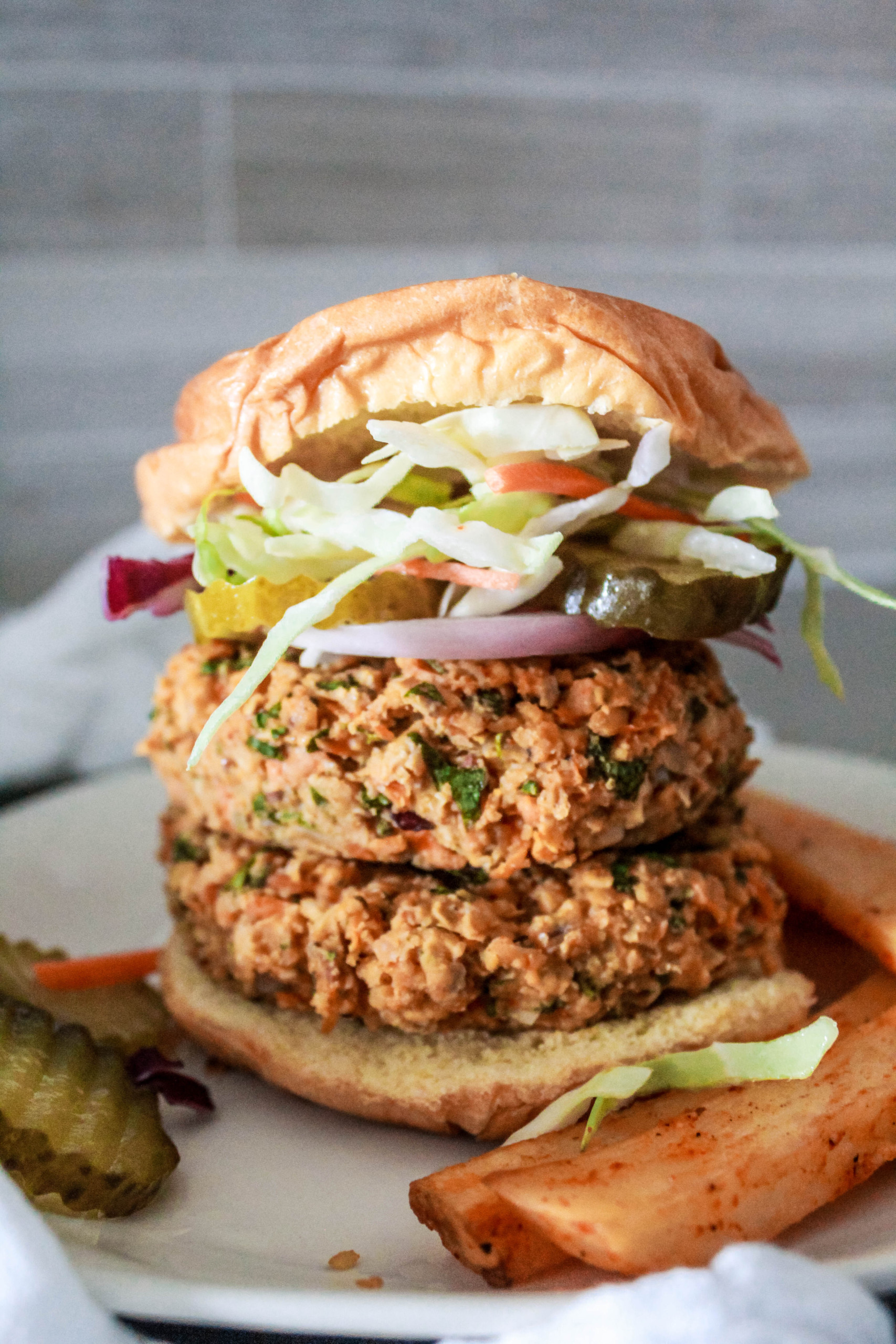 These easy Chunky Chickpea Burger patties are juicy and full of flavor! Try them as a classic burger, wrapped in lettuce, or as protein in a grain bowl. #veggieburger #chickpeas #veganburger