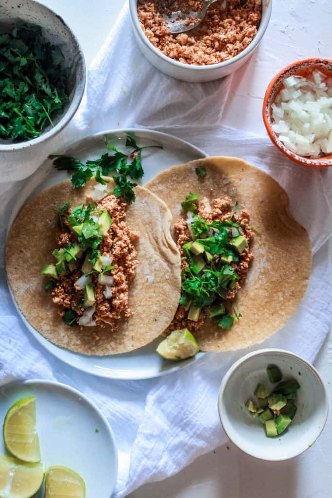 Tasty vegan tacos made with cauliflower as taco meat grilled in a skillet! This taco recipe is delicious and ready in 20 minutes!