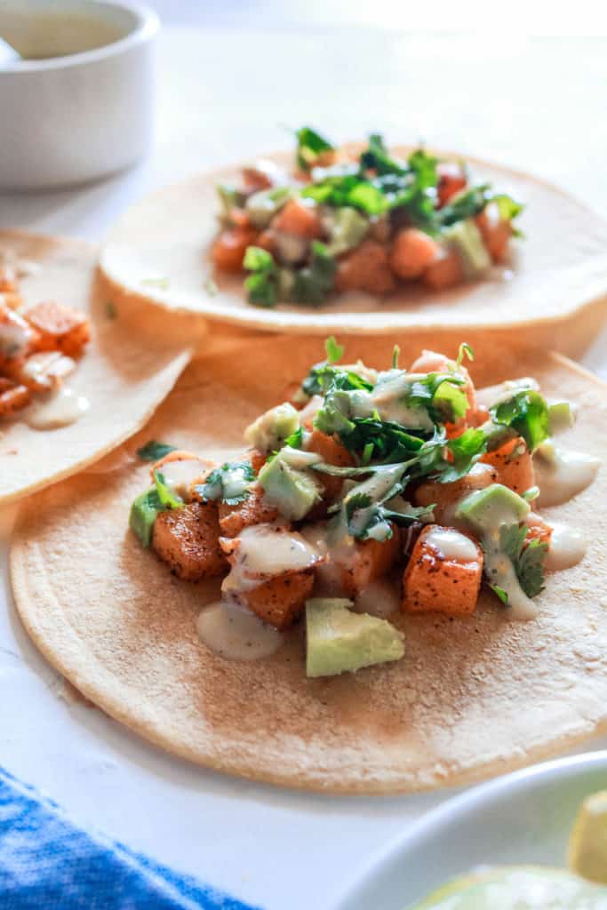 These healthy, Roasted Butternut Squash Tacos make a quick weeknight meal. It’s full of fall flavors, buttery, and a little nutty! #butternutsquash #taco #veganrecipe