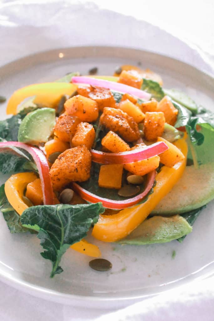 Roasted butternut squash salad full of fall flavors and spices! It makes an easy side dish or dinner!