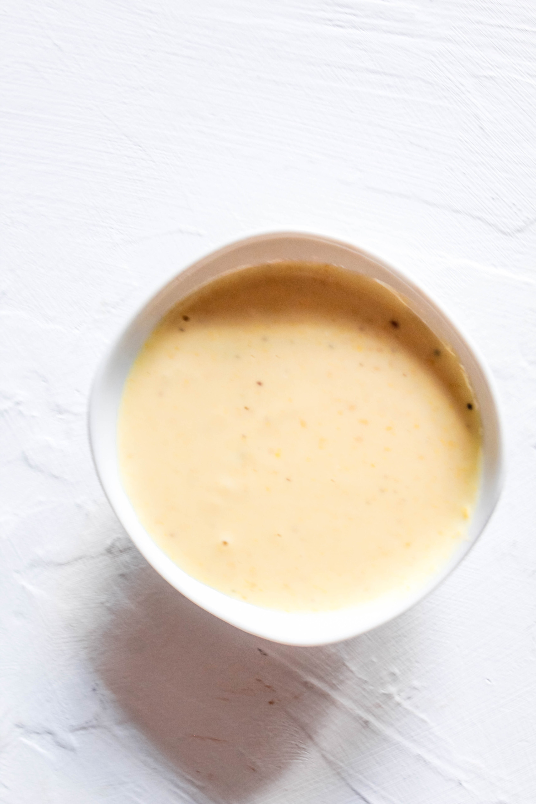 Healthy, oil-free, gluten-free dressing that works well with salads, tacos, buddha bowls, and vegetable sides! #dressing #maple #healthy #homemade