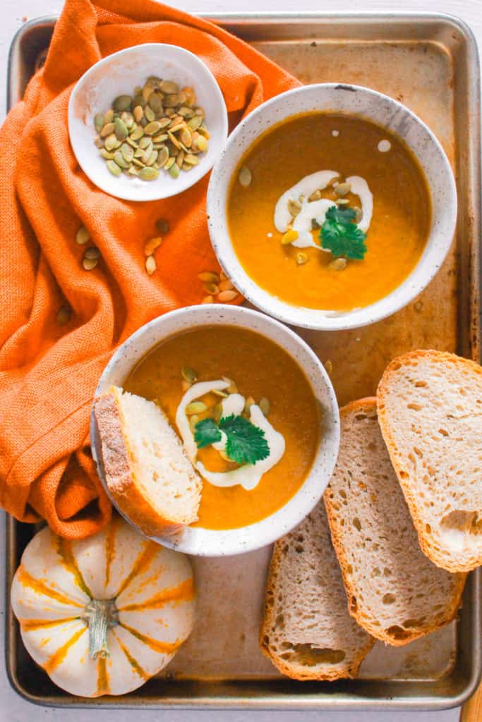 Make this healthy, pumpkin soup in under 30 minutes! It’s creamy, vegan, dairy-free, and mildly sweet! #healthy #vegan #dairyfree