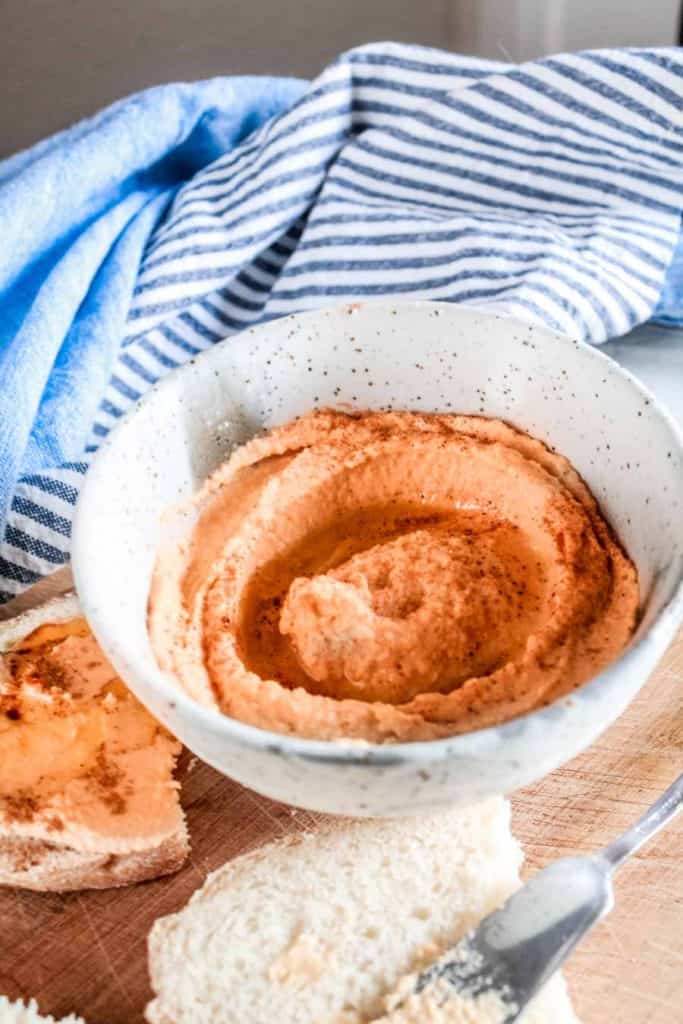 Super easy Sweet Potato Hummus recipe that takes 5 minutes to make from start to finish! No need to roast sweet potatoes! #hummus #sweetpotato #veganrecipe