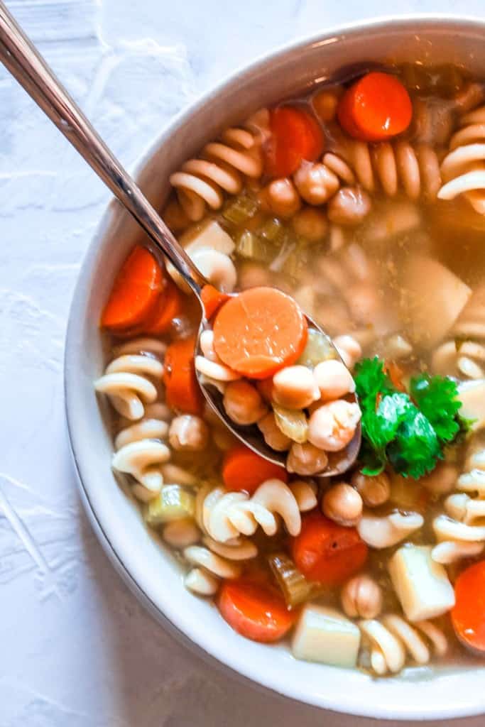 Hearty, comforting Chickpea Noodles Soup that will warm you up on a chilly day. This easy recipe only takes 30 minutes to make!