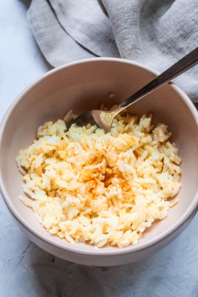 Learn how to make rice five simple different ways with items in your pantry and freezer. Make one big batch of rice and add a variety of everyday ingredients to vary up your meals throughout the week!