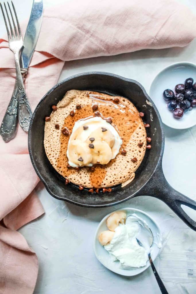 Easy, simple, and healthy vegan pancakes that are super fluffy and extremely delicious! This is the best basic vegan pancake recipe that you can customize to your liking! #veganpancakes #pancake #dairyfree